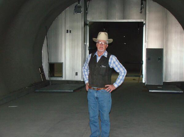 Lee Hudson standing in Hudson Ranch wine cave
